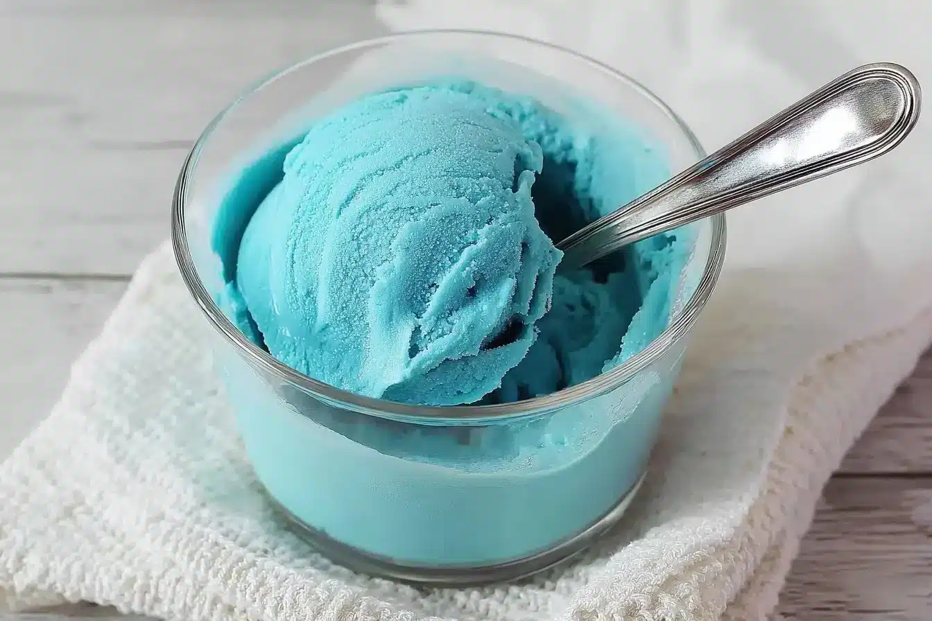 Scoop of Blue Moon Ice Cream in a waffle cone