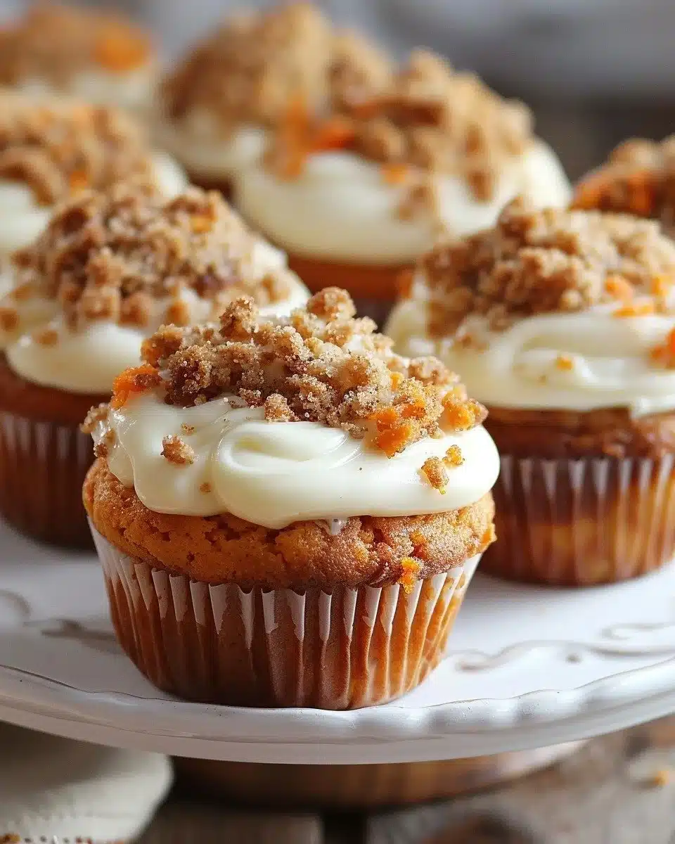 Carrot cake muffins filled with creamy cheesecake for a delicious dessert