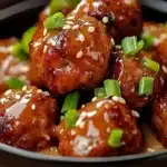 Delicious Korean barbecue meatballs served with dipping sauce.