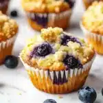 Ultimate moist and flavorful blueberry muffins fresh out of the oven