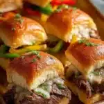 Delicious Philly Cheesesteak Sliders served at a party.