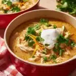 Bowl of Keto White Chicken Chili topped with cilantro and lime