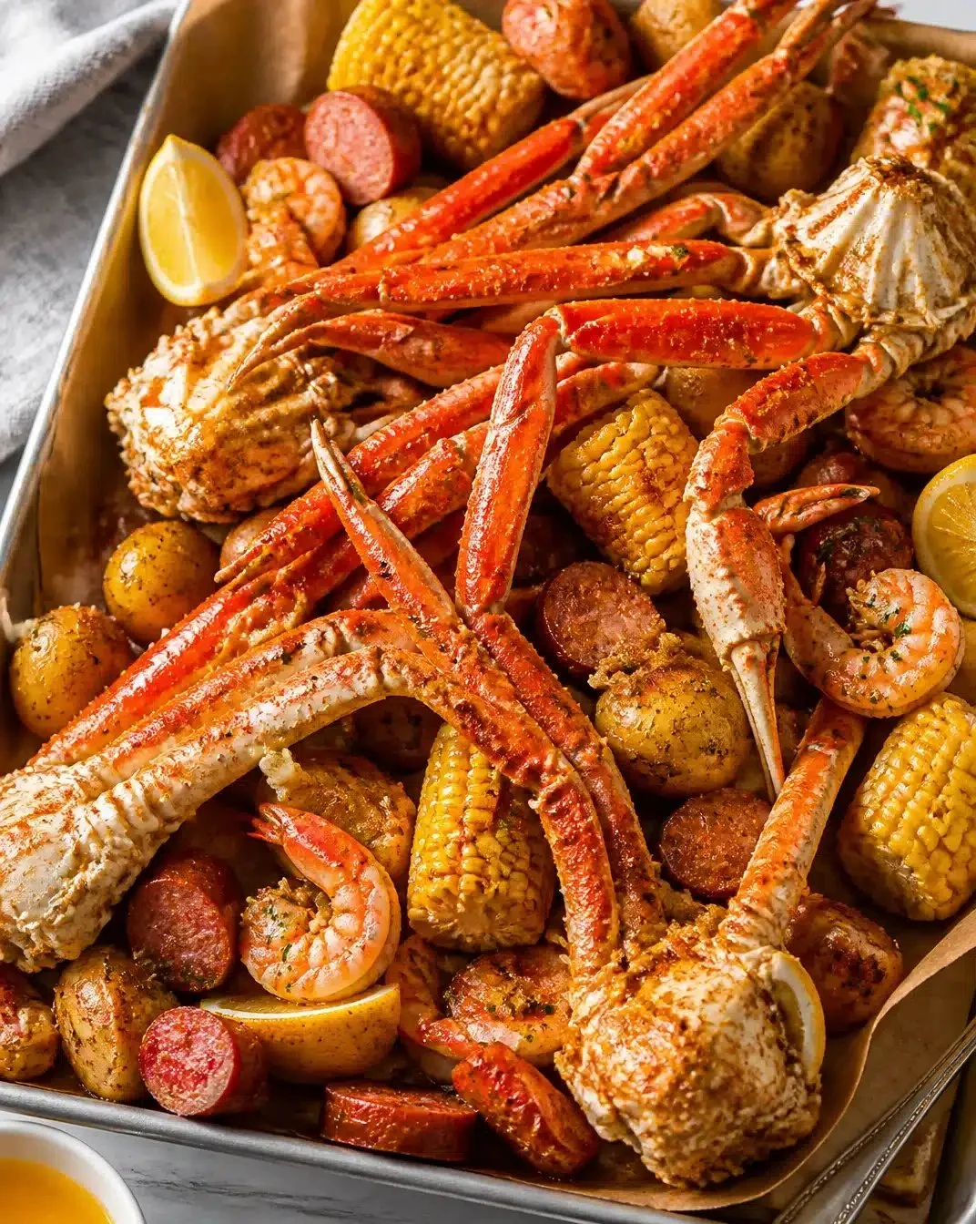 Delicious Coastal Crab Boil dish featuring fresh crabs and traditional sides.