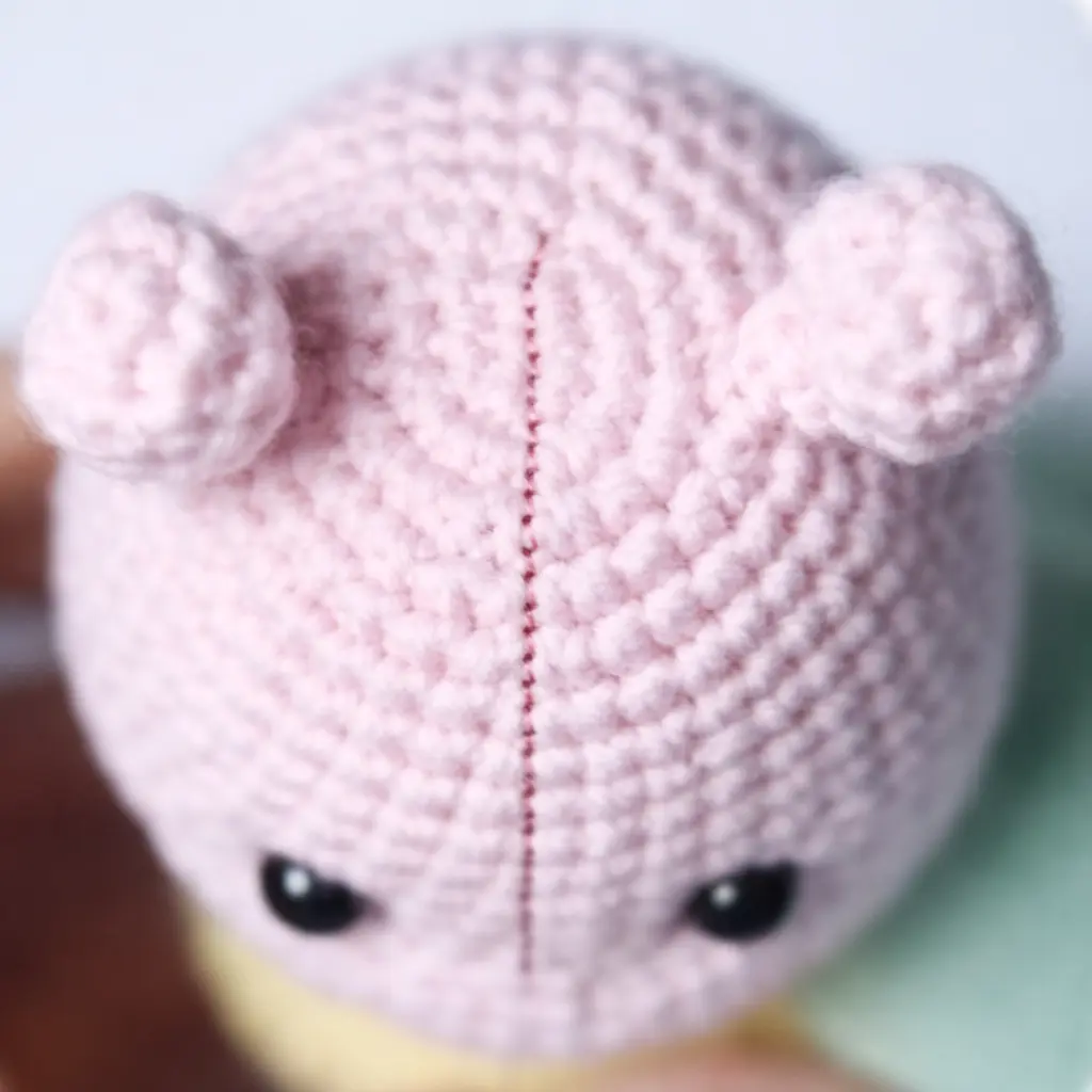 Pastel Caterpillar Crochet Pattern Free Amigurumi Tutorial 5 Antennae step for pastel caterpillar crochet pattern showing pink crochet antenna pieces